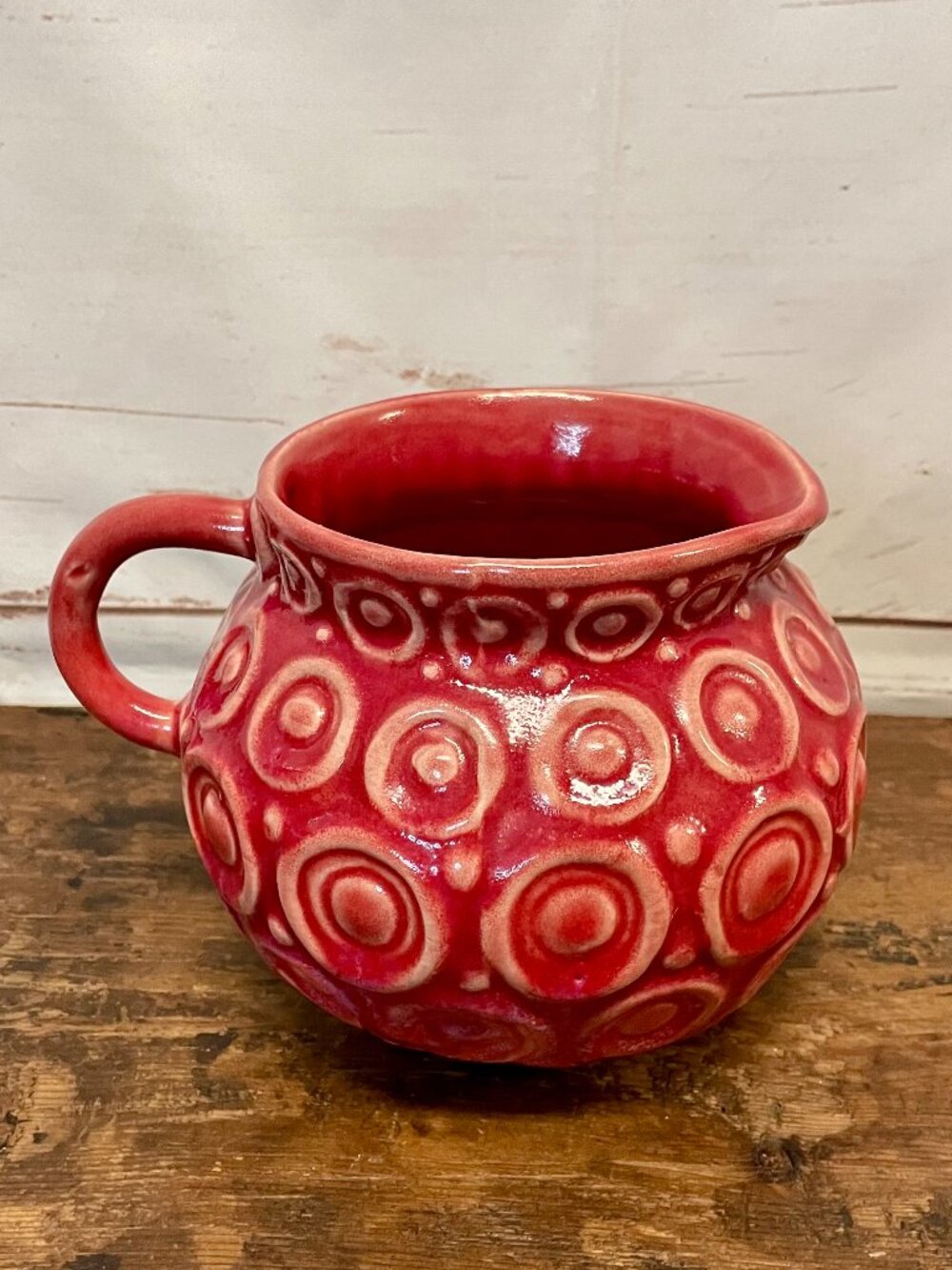 Anthropologie Embossed textured ceramic ball pitcher